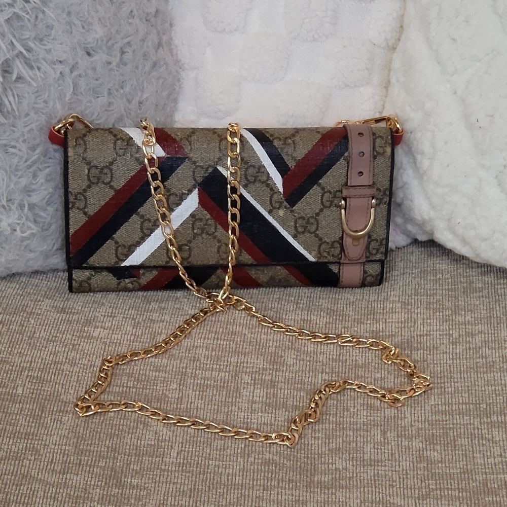 Gucci GG coated canvas Guccissima pink leather strap..Authentic..